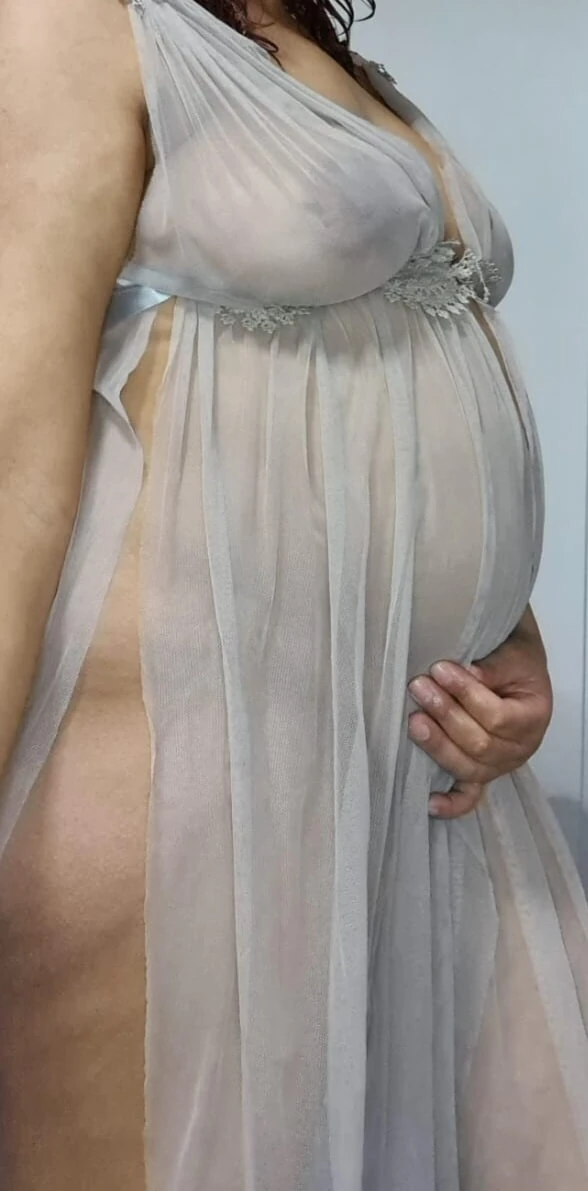 Pregnant MILF posing